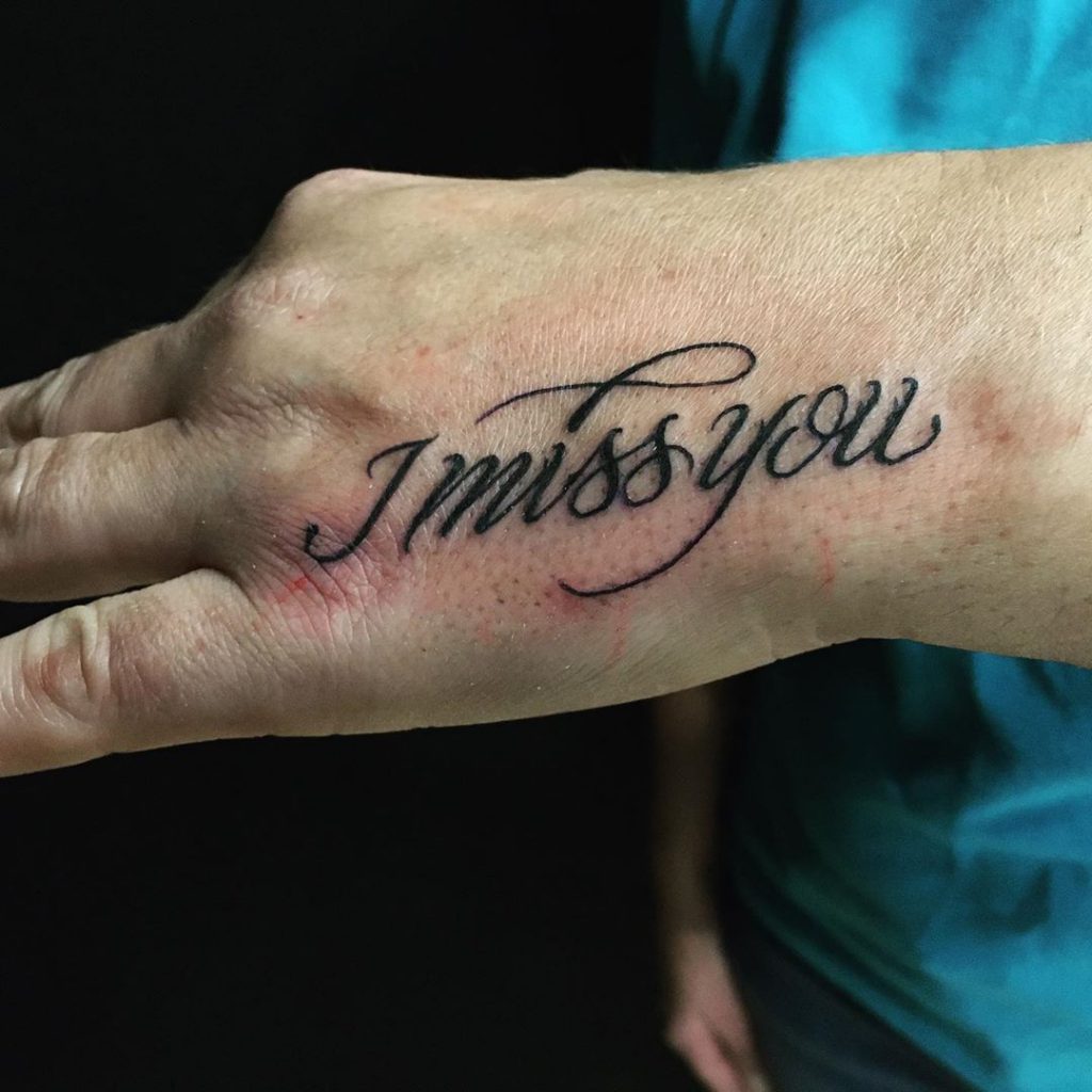 Tatouage calligraphie « I miss you »